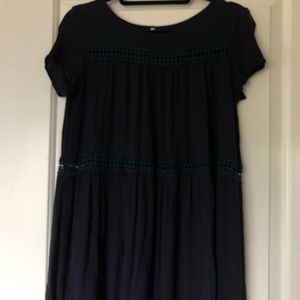 Navy swing dress with lace detailing